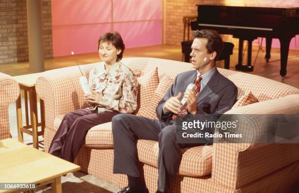 Comic actors Janine Duvitski and Hugh Laurie in a sketch from the BBC television series 'A Bit of Fry and Laurie', April 12th 1994.