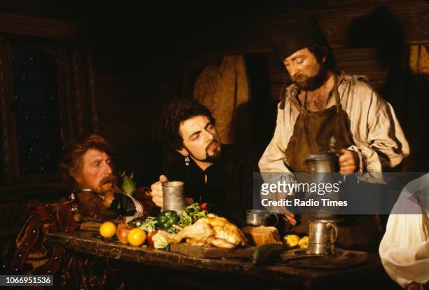 Actors Tom Baker, Rowan Atkinson and Tony Robinson in a scene from episode 'Potato' of the BBC television sitcom 'Black Adder II', June 23rd 1985.
