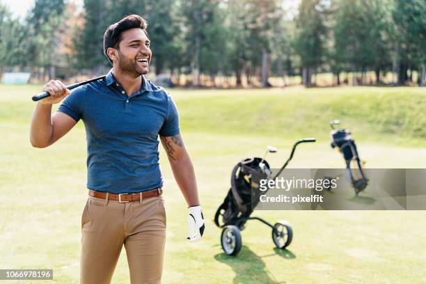 happy golf player - golf excitement stock pictures, royalty-free photos & images