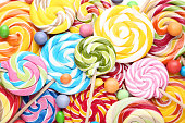 Background of sweet candies and lollipops