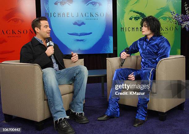 Carson Daly and Michael Jackson during Michael Jackson First-Ever In-Store Signing for His New Album "Invincible" at Virgin Megastore, Times Square...