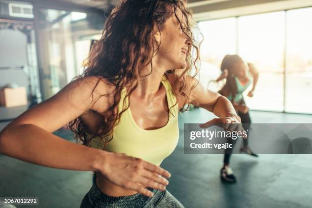 dance fitness - zumba dance stock pictures, royalty-free photos & images