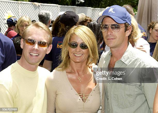 Bart Conner, Nadia Comaneci & Luke Perry during Target "A Time For Heroes" To Benefit The Elizabeth Glaser Pediatric AIDS Foundation at Mandeville...