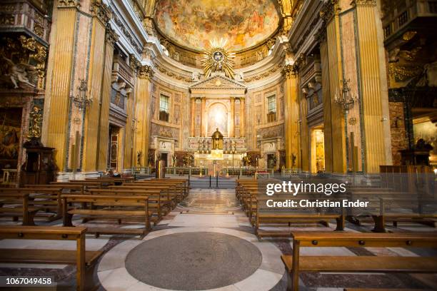 Rome, Italy Displaying the main nave with altar inside the Jesuit church Il Gesù, Rome. It is the mother church of the foundation of Jesus, founded...