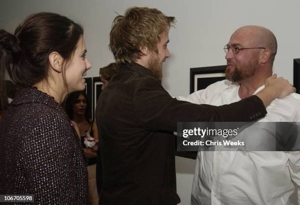 Sandra Bullock, Ryan Gosling and photographer Dan Winters attend the artist's reception for Winters' gallery showing entitled "La Ciudad," Saturday,...