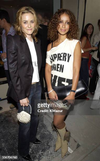 Alicia Silverstone and Mya during Mercedes Benz Fashion Week 2003 - Opening of the First Stella McCartney Store Worldwide at Stella McCartney Store...