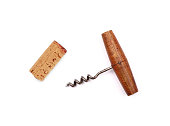 Vintage wine bottle opener and cork isolated