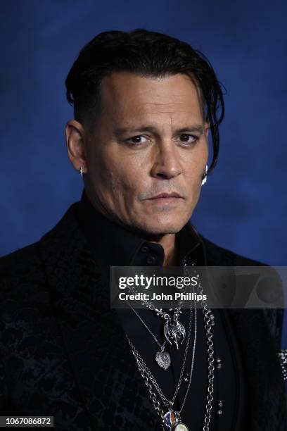 Johnny Depp attends the UK Premiere of "Fantastic Beasts: The Crimes Of Grindelwald" at Cineworld Leicester Square on November 13, 2018 in London,...