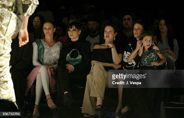Bjork, Shannon Factor, wearing Alvin Valley pants and Judith Ripka jewelry and Mimi Rogers with her daughter
