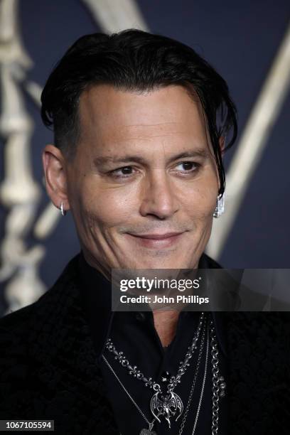 Johnny Depp attends the UK Premiere of "Fantastic Beasts: The Crimes Of Grindelwald" at Cineworld Leicester Square on November 13, 2018 in London,...