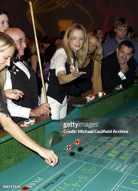 Heather Graham rolls the dice. During Maurice Lacroix Presents The Junior League of Los Angeles "Viva Los Angeles" Casino Night - Inside at Jim...
