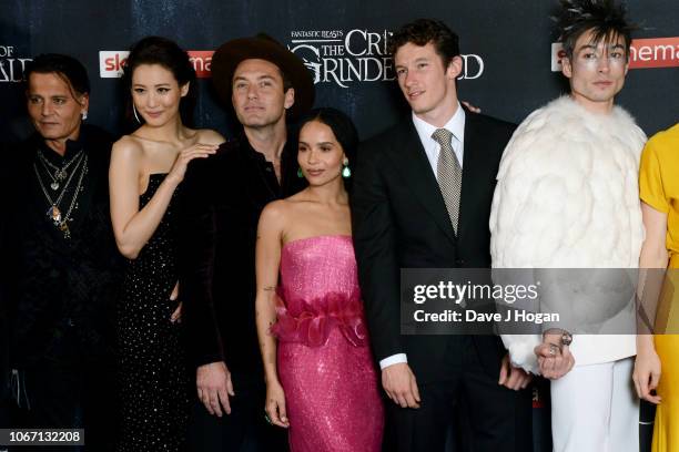 Johnny Depp, Claudia Kim, Jude Law, Zoe Kravitz, Callum Turner and Ezra Miller attend 'Fantastic Beasts: The Crimes Of Grindelwald' UK Premiere at...