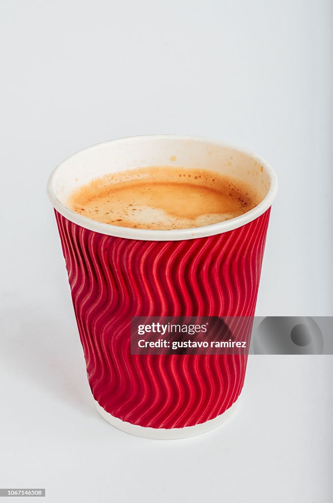 Red glass of espresso coffee