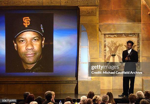 Jamie Foxx jokes about Denzel's hat preference. During The 17th Annual American Cinematheque Award Honoring Denzel Washington - Show and Backstage at...