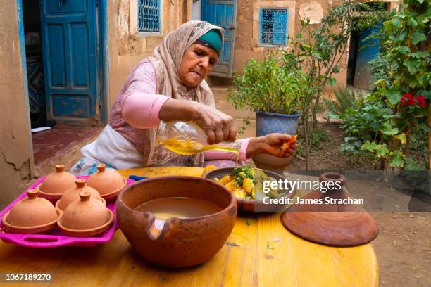 portrait of berber old woman in traditional dress, agounssan, high atlas, morocco (model release) - tajine fotografías e imágenes de stock