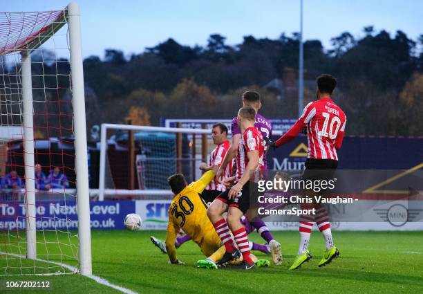 Lincoln City's Matt Rhead scores the opening goal during the The Emirates FA Cup Second Round match between Lincoln City and Carlisle United at...