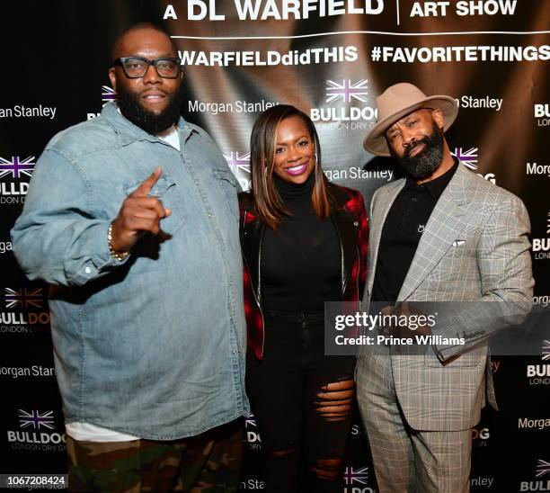 Killer Mike, Kandi Burruss and DL Warfield attend a DL Warfield Art Show at Westside Cultural Art Center on November 30, 2018 in Atlanta, Georgia.