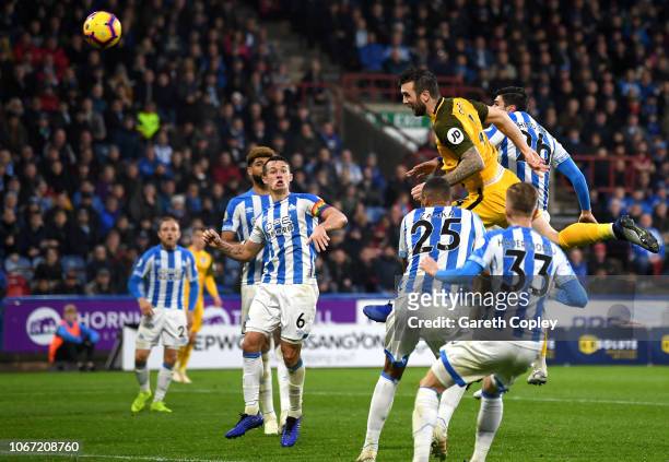 Shane Duffy of Brighton and Hove Albion scores his team's first goal during the Premier League match between Huddersfield Town and Brighton & Hove...