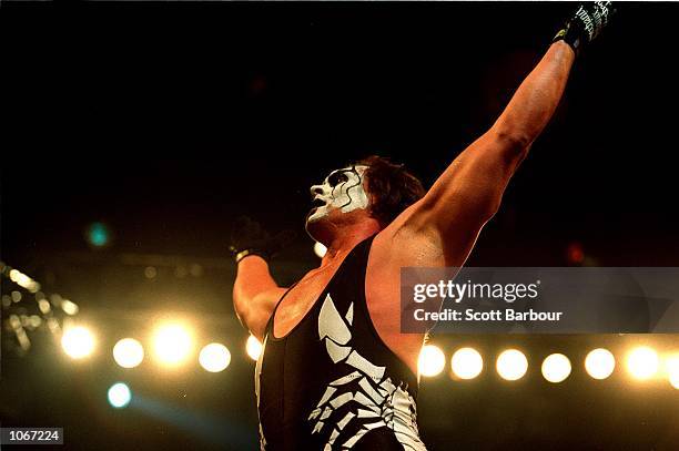 Sting celebrates after defeating Mike Sanders after their bout at the World Chamionship Wrestling ''Thunder Down Under'' night at the Sydney...