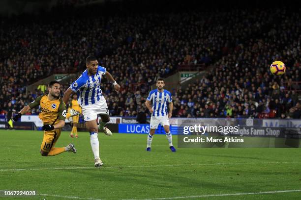 Florin Andone of Brighton and Hove Albion scores their 2nd goal during the Premier League match between Huddersfield Town and Brighton & Hove Albion...