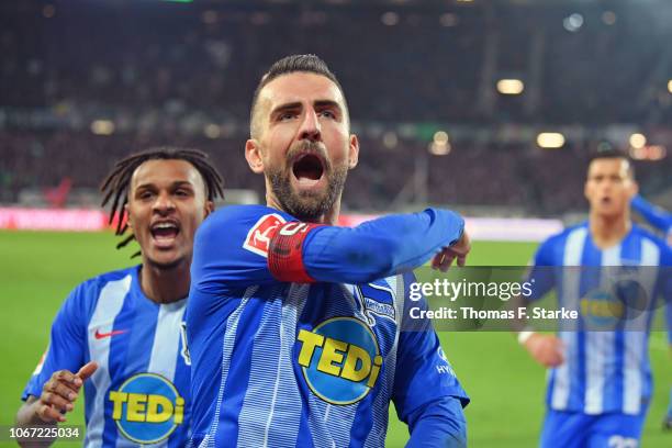 Valentino Lazaro and Vedad Ibisevic of Berlin celebrate during the Bundesliga match between Hannover 96 and Hertha BSC at HDI-Arena on December 1,...