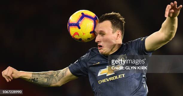 Manchester United's English defender Phil Jones heads the ball during the English Premier League football match between Southampton and Manchester...