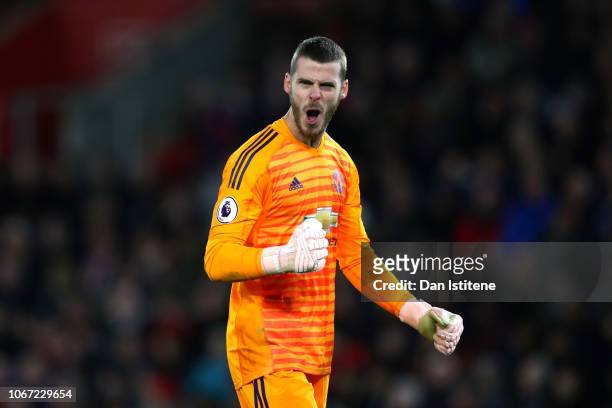 David De Gea of Manchester United celebrates after teammate Ander Herrera scores their team's second goal during the Premier League match between...
