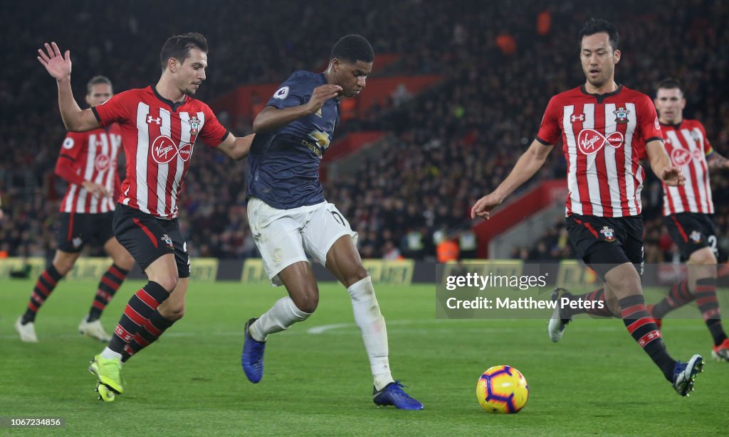 Marcus Rashford of Manchester United in action with Cedric Soares and ...
