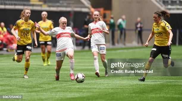 Players Synne Skinnes Hansen and Isabell Bachor with Sandviken players Camilla Ervik and Karoline Bakken Lauten during the Norwegian Cup Final match...