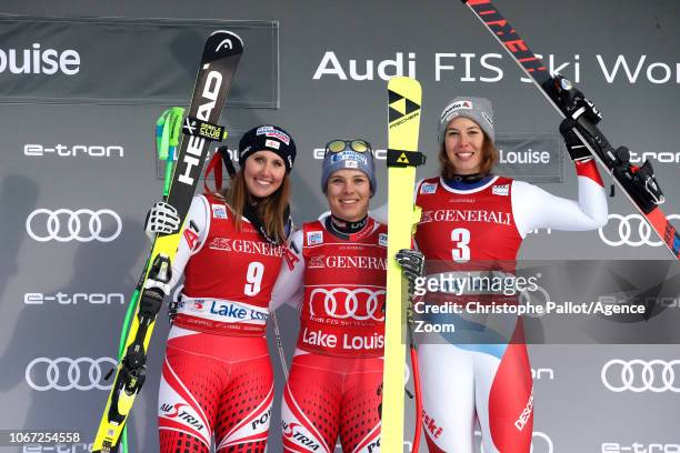 Dominique Gisin of Switzerland takes 3rd place, Nicole Schmidhofer of Austria takes 1st place, Cornelia Huetter of Austria takes 2nd place during the...