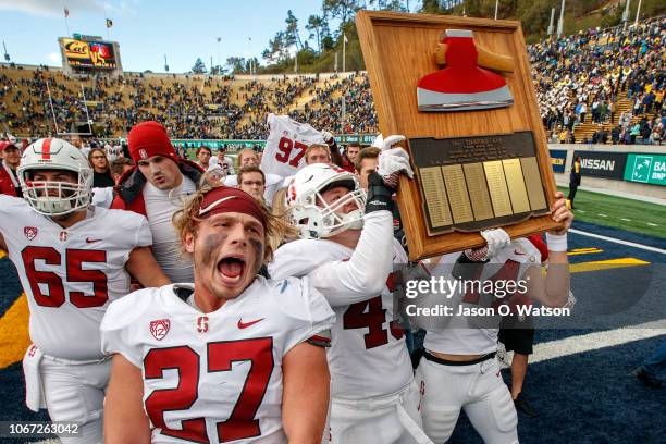 The Stanford Cardinal celebrate with the Stanford Axe after the game against the California Golden Bears at California Memorial Stadium on December...