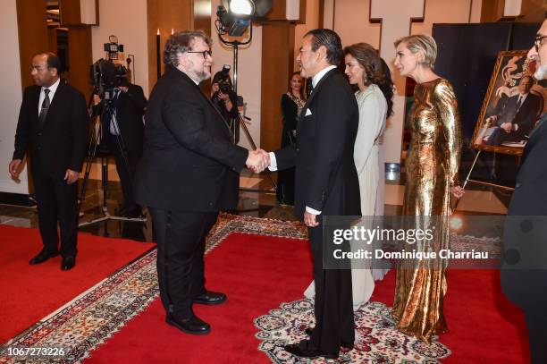 Prince Moulay Rachid of Morocco welcomes Guillermo Del Toro before the Royal Dinner during the 17th Marrakech International Film Festival on December...