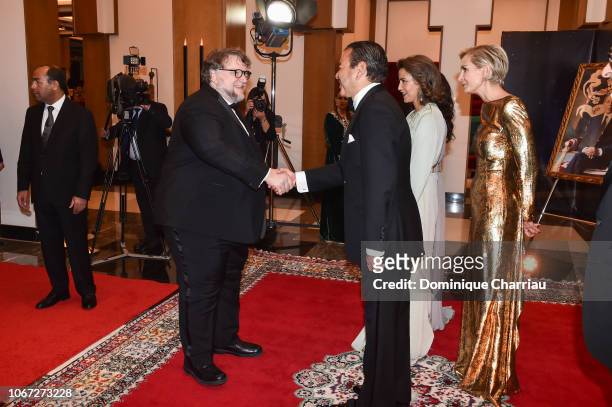 Prince Moulay Rachid of Morocco welcomes Guillermo Del Toro before the Royal Dinner during the 17th Marrakech International Film Festival on December...
