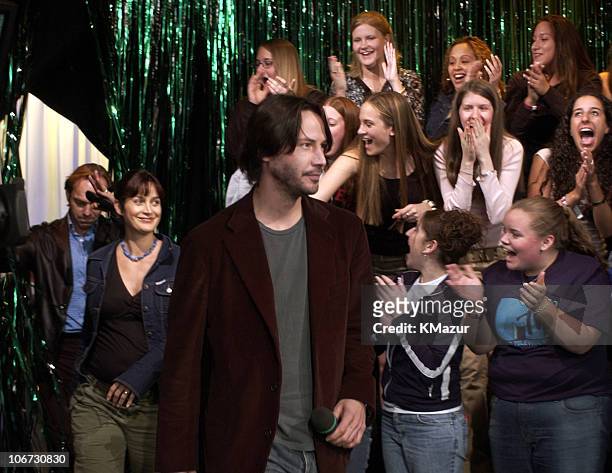 Hugo Weaving, Carrie-Anne Moss and Keanu Reeves greet their fans