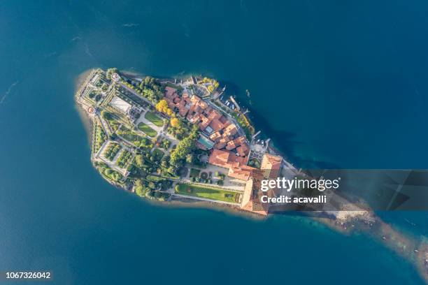 palace and garden on an island on a lake - isola bella stock pictures, royalty-free photos & images