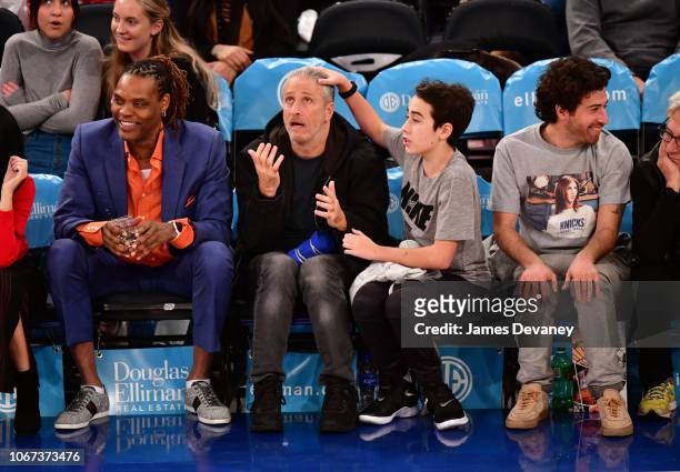 Latrell Sprewell, Jon Stewart, Nathan Stewart and Jake Hoffman attend New York Knicks vs Milwaukee Bucks game at Madison Square Garden on December 1,...