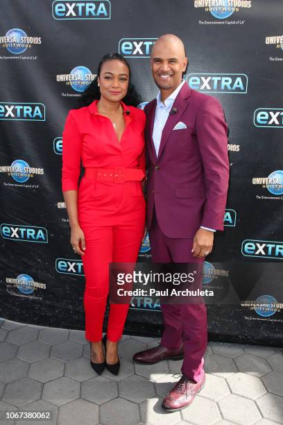 Actors Tatyana Ali and Dondre Whitfield visits "Extra" at Universal Studios Hollywood on November 13, 2018 in Universal City, California.