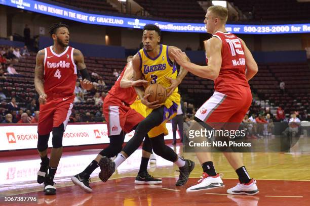 Johnathan Williams of the South Bay Lakers drives against Markel Crawford, Dusty Hannahs, and Tanner McGrew of the Memphis Hustle during an NBA...