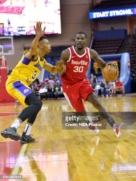 Kyle Casey of the Memphis Hustle drives against Johnathan Williams of the South Bay Lakers during an NBA G-League game on December 1, 2018 at Landers...