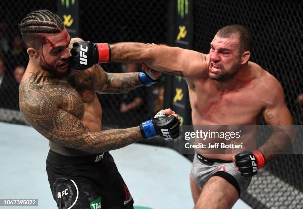 Mauricio 'Shogun' Rua of Brazil punches Tyson Pedro of Australia in their light heavyweight bout during the UFC Fight Night event inside Adelaide...