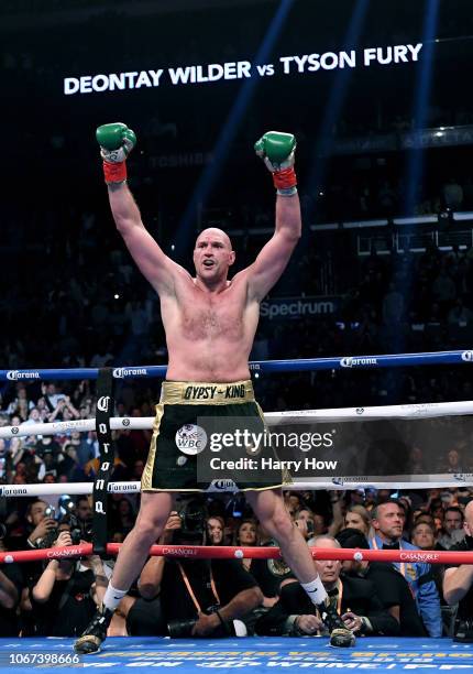 Tyson Fury celebrates at the end of the 12th round fighting to a draw with Deontay Wilder during the WBC Heavyweight Championship at Staples Center...