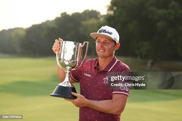 Cameron Smith holds the Joe Kirkwood Cup after winning on day four of the 2018 Australian PGA Championship at Royal Pines Resort on December 2, 2018...