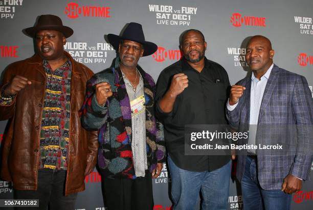 Earnie Shavers, Buster Douglas, Michael Spinks, Riddick Bowe, and Evander Holyfield attend the Heavyweight Championship of The World 'Wilder vs....