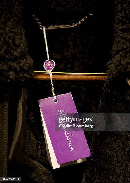 Label hangs from a coat at the Ralph Lauren store in London, U.K., on Thursday, Nov. 11, 2010. Polo Ralph Lauren Corp., the New York-based seller of...