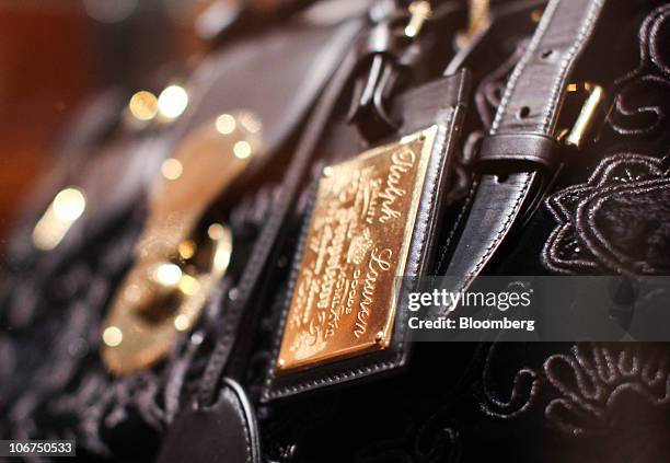 Label hangs from a handbag at the Ralph Lauren store in London, U.K., on Thursday, Nov. 11, 2010. Polo Ralph Lauren Corp., the New York-based seller...