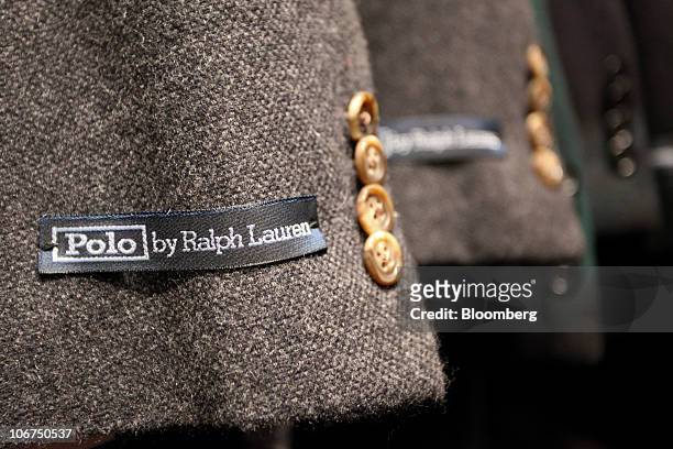 Branded labels sit on men's clothing at the Ralph Lauren store in London, U.K., on Thursday, Nov. 11, 2010. Polo Ralph Lauren Corp., the New...