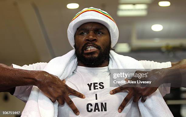 Audley Harrison shows off a message on his t-shirt after a training session held at Hatton Health and Fitness Gym in Hyde on November 11, 2010 in...