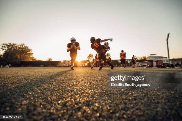 american football game - guard american football player stock pictures, royalty-free photos & images