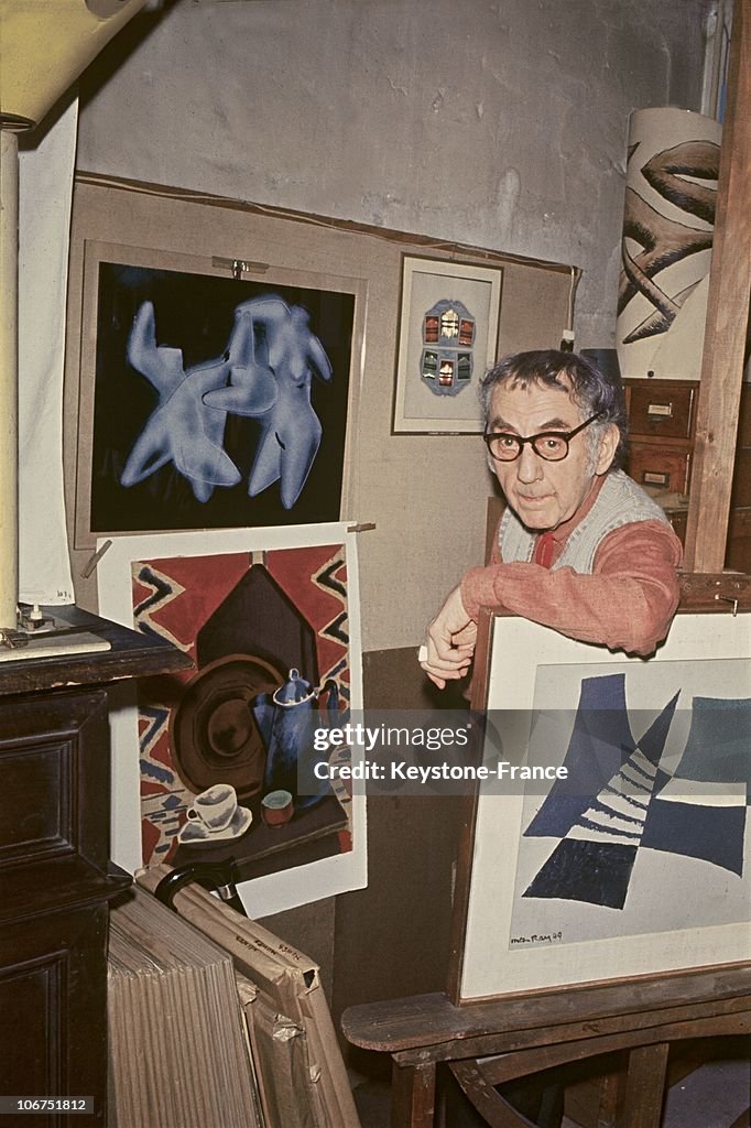 Man Ray With His Artworks In 1970