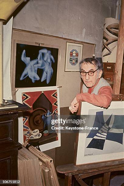 The American Painter-Photographer Man Ray, Aged 80, Among His Surrealist Paintings In His Paris Apartment On April 20, 1970. One Of His Solarized...